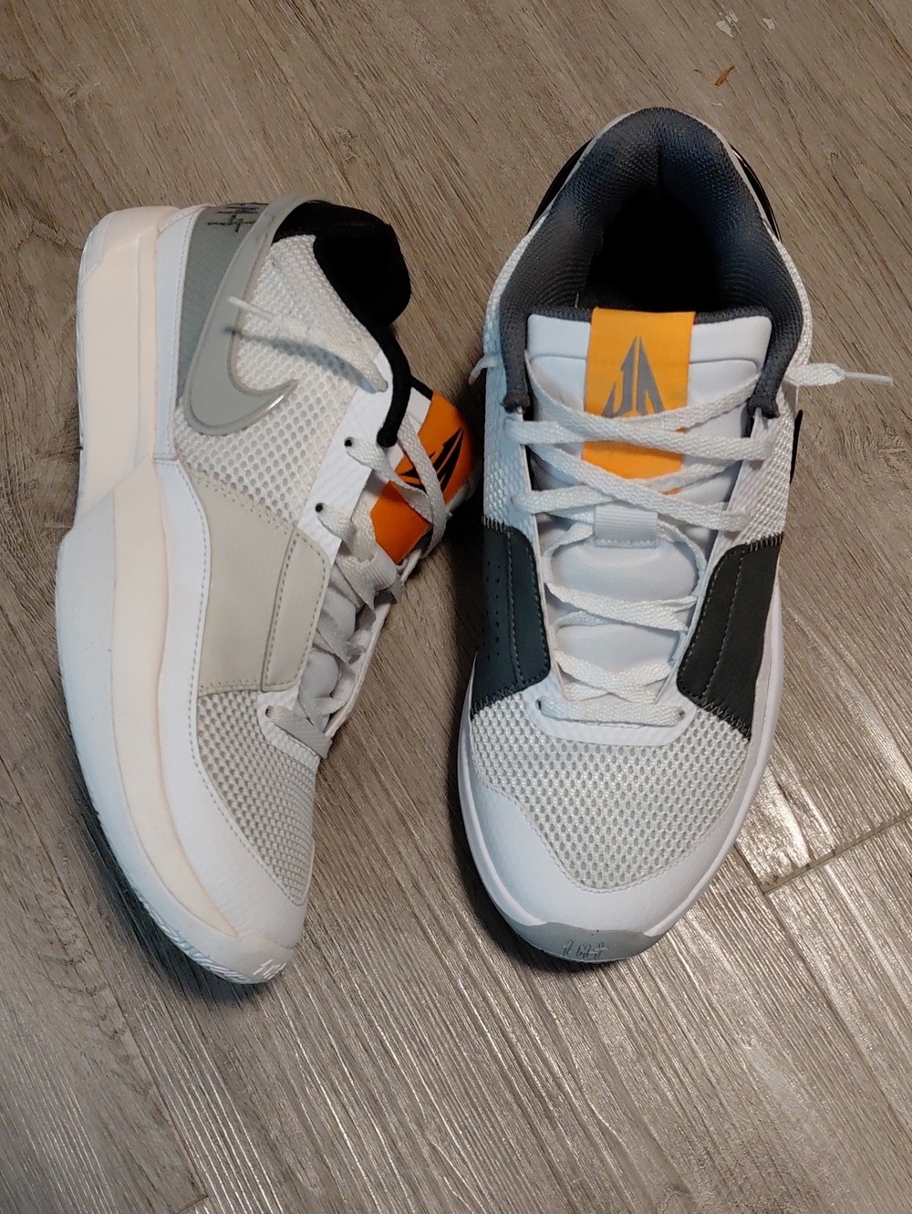 Nike Men's White and Gray Sneakers with Orange Tongue Accent